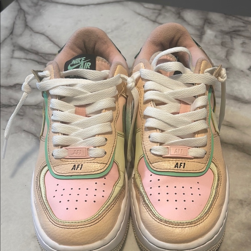 Nike Air Force 1 Pink and Gold Sneakers